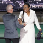 
              Oprah Winfrey, right, presents the Emmy for outstanding lead actor in a limited or anthology series or movie to Michael Keaton, left, for "Dopesick" at the 74th Primetime Emmy Awards on Monday, Sept. 12, 2022, at the Microsoft Theater in Los Angeles. (AP Photo/Mark Terrill)
            