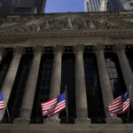 
              American flags fly outside the New York Stock Exchange, Friday, Sept. 23, 2022, in New York. Stocks tumbled worldwide Friday on more signs the global economy is weakening, just as central banks raise the pressure even more with additional interest rate hikes. (AP Photo/Mary Altaffer)
            
