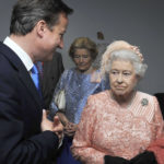 
              FILE -  Britain's Queen Elizabeth II, right, and Prime Minister David Cameron arrive for the Opening Ceremony of the 2012 Olympic Summer Games at the Olympic Stadium in London, Friday, July 27, 2012. In seven decades on the throne, Queen Elizabeth II saw 15 British prime ministers come and go, from Winston Churchill to Margaret Thatcher to Boris Johnson to Liz Truss.  (John Stillwell, Pool Photo via AP, File)
            