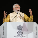
              Indian Prime Minister Narendra Modi speaks at the inauguration of the revamped Central Vista Avenue at the India Gate in New Delhi, India, Thursday, Sept. 8, 2022. Modi urged the country to shed its colonial ties in a ceremony to rename Rajpath, a boulevard that was once called Kingsway after King George V, Modi called it a "symbol of slavery" under the British Raj. (AP Photo/Manish Swarup)
            