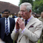 
              FILE - Britain's Prince Charles greets the crowd during a visit to the Peradeniya National Botanical Gardens in Kandy, Sri Lanka, Saturday, Nov. 16, 2013. Charles and his wife Camilla, the Duchess of Cornwall, are in the country for the Commonwealth Heads of government Meeting (CHOGM). In retrospect, it seems Queen Elizabeth II was preparing us all along for her death. Whether it was due to age, ill health or a sense that the end was near, she spent much of the last two years tying up loose ends, making sure the family firm would keep ticking along. (AP Photo/Eranga Jayawardena, File)
            