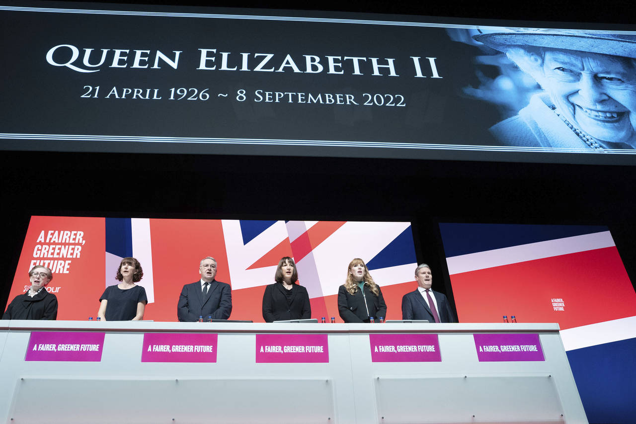 Labour party leader Keir Starmer, right, leads tributes to Queen Elizabeth II as the national anthe...