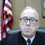
              In this image from video, Hennepin County Judge Peter Cahill speaks while sentencing former Minneapolis Police Officer Thomas Lane Sept. 21, 2022 in Minneapolis. Lane pleaded guilty to a state charge of aiding and abetting second-degree manslaughter in the killing of George Floyd has been sentenced to three years. Lane appeared via video from the Federal Correctional Institution Englewood, the low-security federal prison camp in Littleton, Colorado. (Minnesota Attorney General's Office via AP)
            