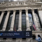 
              FILE - Pedestrians pass the New York Stock Exchange, Thursday, May 5, 2022, in the Manhattan borough of New York.  Stocks are opening lower on Wall Street, Friday, Sept. 30, on pace to close out another losing month.  (AP Photo/John Minchillo, File)
            