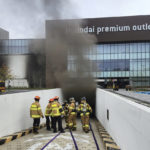 
              South Korean firefighters work at a shopping mall in Daejeon, South Korea, Monday, Sept. 26, 2022. The fire broke out in the basement of the shopping mall Monday, killing a number of people, officials said. (Kwak Sang-hun/Newsis via AP)
            
