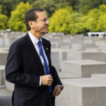 
              Israeli President Isaac Herzog attends a wreath laying ceremony at the Holocaust memorial in Berlin, Germany, Tuesday, Sept. 6, 2022. (AP Photo/Christoph Soeder)
            