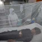 
              Pakistani patients suffering from dengue fever, a mosquito-borne disease, are treated in an isolation ward, at a hospital in Lahore, Pakistan, Friday, Sept. 23, 2022. Pakistan has deployed thousands of additional doctors and paramedics in the country's worst flood-hit province to contain the spread of diseases that have killed over 300 people among the flood victims, officials said Friday. (AP Photo/K.M. Chaudary)
            