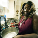 
              Bennie Hudson, 65, executive director of the Mississippi Faith-Based Coalition for Community Renewal, boils any tap water she uses due to longstanding water problems in Jackson, Miss., Thursday, Sept. 1, 2022. (AP Photo/Rogelio V. Solis)
            