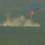 
              This image provided by Blue Origin shows a capsule containing science experiments after a launch failure and parachuting onto the desert floor on Monday, Sept. 12, 2022. Jeff Bezos' rocket company has suffered its first launch failure. No one was aboard, only science experiments. The Blue Origin rocket veered off course over West Texas about 1 1/2 minutes after liftoff Monday. (Blue Origin via AP)
            