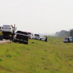 
              Police and investigators are seen at the side of the road outside Rosthern, Saskatchewan on Wednesday, Sept. 7, 2022. Canadian police arrested the second suspect in the stabbing deaths of 10 people in the province of Saskatchewan on Wednesday after a three-day manhunt during which they had found the body of his brother. (Kelly Geraldine Malone/The Canadian Press via AP)
            