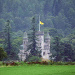 
              The Royal Banner of Scotland above Balmoral Castle is flown at half-mast following the announcement of the death of Queen Elizabeth II, in Royal Deeside, Aberdeenshire, Scotland, Thursday, Sept. 8, 2022. Britain's longest-reigning monarch and a rock of stability across much of a turbulent century, has died. She was 96. Buckingham Palace announced Sept. 8 that she died at Balmoral Castle, her summer residence in Scotland, where members of the royal family had rushed to her side after her health took a turn for the worse. (Owen Humphreys/PA via AP)
            