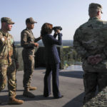 
              U.S. Vice President Kamala Harris stands at a military observation post as she visits the demilitarized zone (DMZ) separating the two Koreas, in Panmunjom, South Korea, Thursday, Sept. 29, 2022. (Leah Millis/Pool Photo via AP)
            
