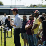 
              After taking a five-hour bus trip, family of the Uvalde shooting massacre stand with Texas Democratic gubernatorial candidate Beto O'Rourke, center, during a pre-campaign debate news conference, Friday, Sept. 30, 2022, in Edinburg, Texas. O'Rourke will face Gov. Greg Abbott in a debate Friday evening. (AP Photo/Eric Gay)
            