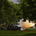
              The Royal Artillery fires a gun salute to mark the Queen's death in Hyde Park in London, Friday, Sept. 9, 2022. Queen Elizabeth II, Britain's longest-reigning monarch and a rock of stability across much of a turbulent century, died Thursday Sept. 8, 2022, after 70 years on the throne. She was 96. (AP Photo/Alberto Pezzali)
            