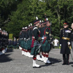 
              King Charles III inspects the Guard of Honour as he arrives to attend the Ceremony of the Keys, at the Palace of Holyroodhouse, Edinburgh, Monday, Sept. 12, 2022. King Charles arrived in Edinburgh on Monday to accompany his late mother’s coffin on an emotion-charged procession through the historic heart of the Scottish capital to a cathedral where it will lie for 24 hours to allow the public to pay their last respects. (Peter Byrne/Pool Photo via AP)
            