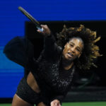 
              Serena Williams, of the United States, serves to Ajla Tomljanovic, of Austrailia, during the third round of the U.S. Open tennis championships, Friday, Sept. 2, 2022, in New York. (AP Photo/Frank Franklin II)
            