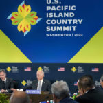 
              President Joe Biden speaks during the first U.S.-Pacific Island Country Summit at the State Department in Washington, Thursday, Sept. 29, 2022. Secretary of State Antony Blinken listens at left. (AP Photo/Susan Walsh)
            