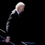 
              President Joe Biden walks down some stairs during an event at Henry Maier Festival Park in Milwaukee, Monday, Sept. 5, 2022. Biden is in Wisconsin this Labor Day to kick off a nine-week sprint to the crucial midterm elections.   (AP Photo/Morry Gash)
            