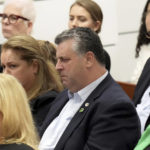
              Tony Montalto, seated with his wife, Jennifer Montalto, closes his eyes as Assistant State Attorney Mike Satz details the killings in his closing arguments in the penalty phase of the trial of Marjory Stoneman Douglas High School shooter Nikolas Cruz at the Broward County Courthouse in Fort Lauderdale, Fla. on Tuesday, Oct. 11, 2022. The Montalto's daughter, Gina, was killed in the 2018 shootings. Cruz previously plead guilty to all 17 counts of premeditated murder and 17 counts of attempted murder in the 2018 shootings. (Amy Beth Bennett/South Florida Sun Sentinel via AP, Pool)
            
