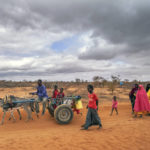 
              Mohamed Ahmed Diriye arrives with others to a displacement camp on the outskirts of Dollow, Somalia, on Tuesday, Sept. 20, 2022.  Somalia is in the midst of the worst drought anyone there can remember. A rare famine declaration could be made within weeks. Climate change and fallout from the war in Ukraine are in part to blame. (AP Photo/Jerome Delay)
            