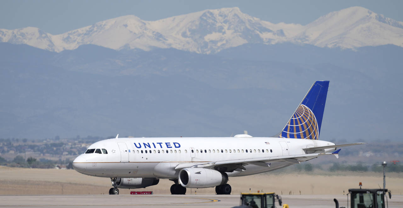 FILE - A United Airlines jetliner taxis for take off from Denver International Airport, Thursday, M...
