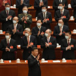 
              Chinese President Xi Jinping arrives for the opening ceremony of the 20th National Congress of China's ruling Communist Party held at the Great Hall of the People in Beijing, China, Sunday, Oct. 16, 2022. China on Sunday opens a twice-a-decade party conference at which leader Xi Jinping is expected to receive a third five-year term that breaks with recent precedent and establishes himself as arguably the most powerful Chinese politician since Mao Zedong. (AP Photo/Mark Schiefelbein)
            