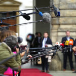 
              France's President Emmanuel Macron speaks with the media as he arrives for a meeting of the European Political Community at Prague Castle in Prague, Czech Republic, Thursday, Oct 6, 2022. Leaders from around 44 countries are gathering Thursday to launch a "European Political Community" aimed at boosting security and economic prosperity across the continent, with Russia the one major European power not invited. (AP Photo/Petr David Josek)
            