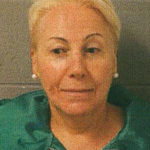 
              FILE -  This booking photo provided by the Winnetka Police Department, shows Irene Donoshaytis, 65, who was charged with felony hate crime on Sept. 2, 2020, after she aggressively confronted Otis Campbell and two other Black people who were bicycle riding near a pier in Winnetka, Ill. Donoshaytis has been sentenced to probation after pleading guilty to a lesser charge. The felony hate crime charge Donoshaytis had faced in Cook County was amended Wednesday, Oct. 19, 2022, to a misdemeanor battery under a plea agreement. (Winnetka Police Department/Chicago Tribune via AP, File)
            