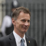 
              Jeremy Hunt, the Chancellor of the Exchequer leaves 10 Downing Street following a Cabinet meeting, the first held by the new British Prime Minister Rishi Sunak, in London, Wednesday, Oct. 26, 2022. Sunak was elected by the ruling Conservative party to replace Liz Truss who resigned. (AP Photo/Frank Augstein)
            