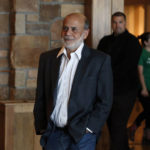 
              FILE - Former Federal Reserve Chairman Ben Bernanke arrives for a reception on the opening night of the annual invitation-only conference of central bankers from around the world, sponsored by the Federal Reserve Bank of Kansas City, at Jackson Lake Lodge in Grand Teton National Park, north of Jackson Hole, Wyo., Thursday, Aug 25, 2016. 2022's Nobel Prize in economic sciences has been awarded to three U.S.-based economists “for research on banks and financial crises.”The award to  Ben S. Bernanke, Douglas W. Diamond and Philip H. Dybvig was announced Monday by the Nobel panel at the Royal Swedish Academy of Sciences in Stockholm. (AP Photo/Brennan Linsley, File)
            