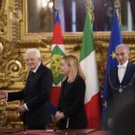 
              Italian President Sergio Mattarella gestures to the newly appointed Italian Premier Giorgia Meloni after the swearing in ceremony of Italy's first far-right-led government since the end of World War II at Quirinal presidential palace in Rome, Saturday, Oct. 22, 2022. (AP Photo/Alessandra Tarantino)
            