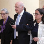 
              From left, Rose Marie Vella, Michael A. Vella, and Mandy Mallia, parents and sister of late journalist Daphne Caruana Galizia, arrive at Valletta Law court, Friday, Oct. 14, 2022. The first trial for the car-bomb assassination of a Maltese journalist who investigated corruption in the tiny Mediterranean island nation has begun. (AP Photo/Jonathan Borg)
            