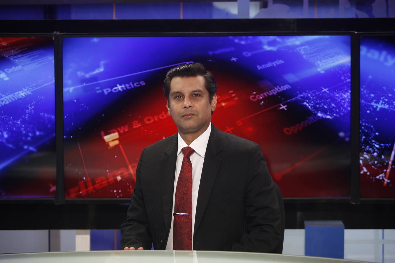 Senior Pakistani journalist Arshad Sharif poses for photograph prior to recoding an episode of  his...