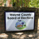 
              The Wayne County Board of Elections sign stands outside their office on Thursday, Sept. 22, 2022, in Goldsboro, N.C. (AP Photo/Hannah Schoenbaum)
            