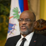
              FILE - Haiti's Prime Minister Ariel Henry speaks during an interview with the Associated Press at his private residence in Port-au-Prince, Tuesday, Sept. 28, 2021. Henry and 18 top-ranking officials have requested on the second week of Oct. 2022, the immediate deployment of foreign armed troops as gangs and protesters paralyze the country. (AP Photo/Odelyn Joseph, File)
            