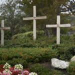 
              Wooden crosses are displayed in the garden at Saddleback Church on Sunday, Oct. 16, 2022, in Lake Forest, Calif. Pastor Andy Wood was recently announced as founding Pastor Rick Warren's successor to the church, which is the second largest in the Southern Baptist Convention, regularly drawing in about 2,500 people with more online every Sunday. (AP Photo/Allison Dinner)
            