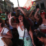 
              Supporters of Brazil's former President Luiz Inacio Lula da Silva celebrate partial results after polls closed in the country's presidential run-off election, in Rio de Janeiro, Brazil, Sunday, Oct. 30, 2022.  On Sunday, Brazilians had to choose between da Silva and incumbent Jair Bolsonaro, after neither got enough support to win outright in the Oct. 2 general election. (AP Photo/Bruna Prado)
            