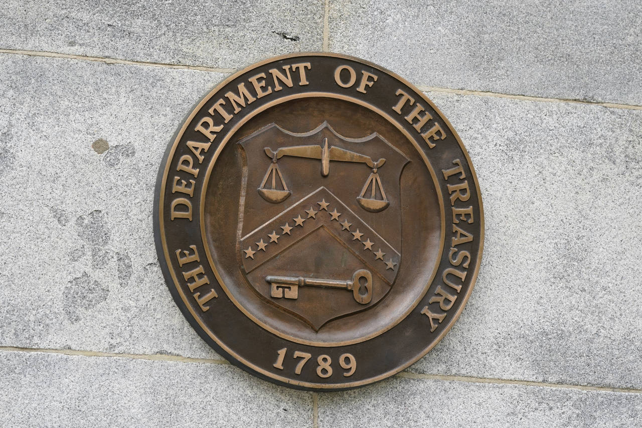 The Department of the Treasury's seal outside the Treasury Department building in Washington on May...