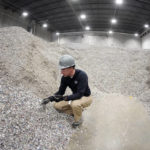 
              Jeremy DeBenedictis, President of Alterra Energy, stands in the storage area of shredded plastics his company receives from recycling facilities in their facility in Akron, Ohio, on Thursday, Sept. 8, 2022. “Our mission is to solve plastic pollution,” said DeBenedictis, company president. “That is not just a tag line. We all truly want to solve plastic pollution.” (AP Photo/Keith Srakocic)
            