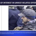 
              This image posted by the DC Metropolitan Police shows James Hoel at the Jan. 6, 2021 insurrection at the U.S. Capitol in Washington, wanted as a person of interest in unrest-related offenses, before the case was taken over by the FBI. Hoel, decked out in tactical gear, a walkie-talkie on his chest, advanced up the Capitol steps with fellow members of the Proud Boys, at the vanguard of the deadly riot. Hoel has not been charged. (DC Metropolitan Police via AP)
            