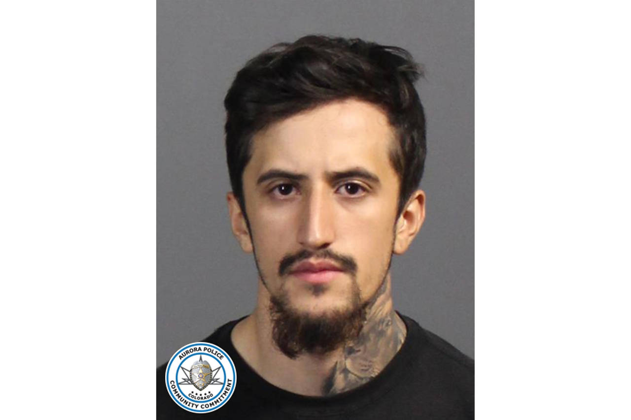 In this undated photo released by the Aurora Police Department is Joseph Mario Castorena. Court rec...