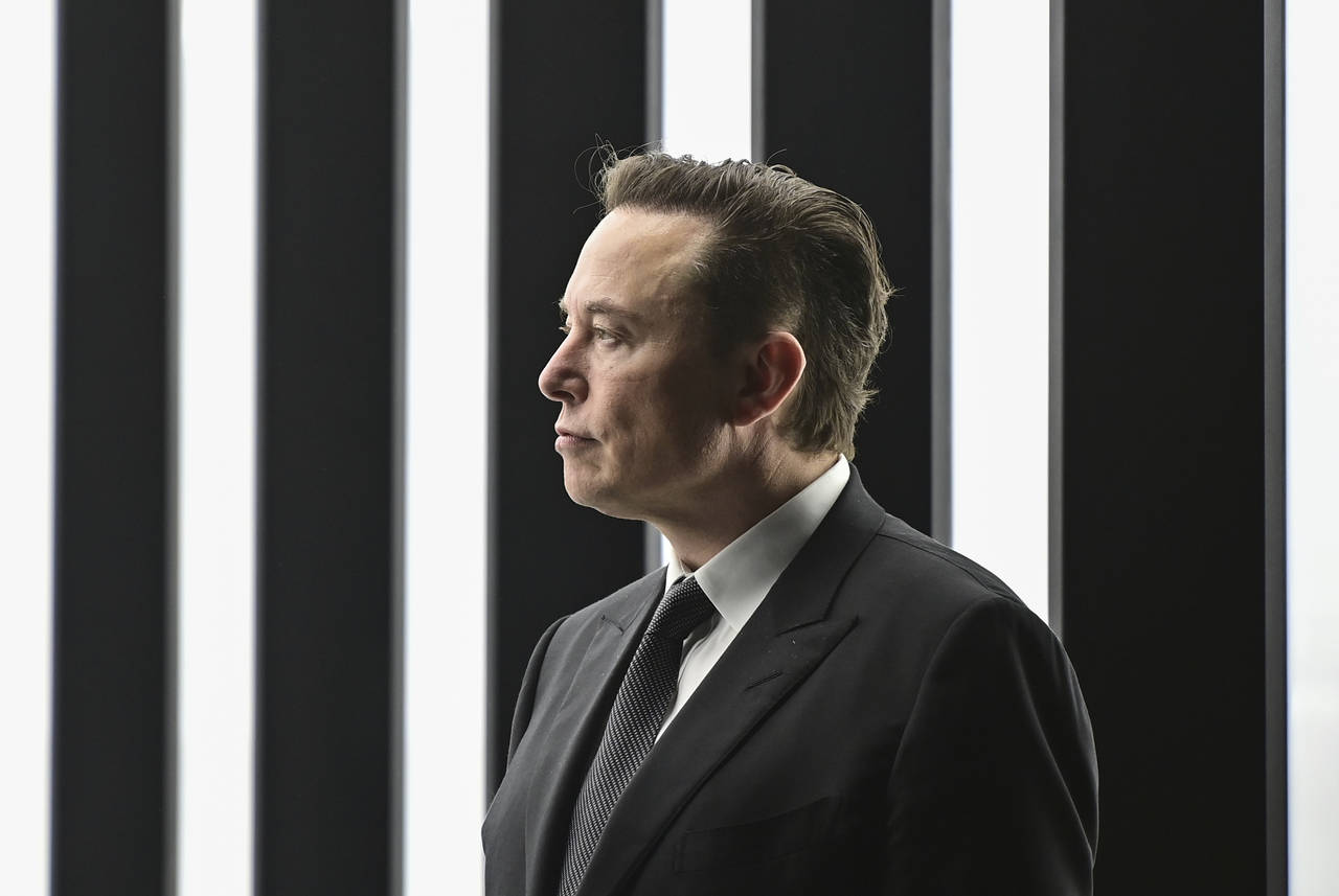 FILE - Elon Musk, Tesla CEO, attends the opening of the Tesla factory Berlin Brandenburg in Gruenhe...