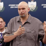 
              FILE - Pennsylvania Lt. Gov. John Fetterman, right, speaks as he stands beside state Attorney General Josh Shapiro during a news conference about legal action in the dispute between health insurance providers UPMC and Highmark, Feb. 7, 2019, in Pittsburgh. (AP Photo/Keith Srakocic, File)
            