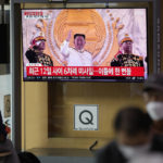 
              A TV screen showing a news program reporting about North Korea's missile launch with file footage of North Korean leader Kim Jong Un, is seen at the Seoul Railway Station in Seoul, South Korea, Thursday, Oct. 6, 2022. North Korea launched two ballistic missiles toward its eastern waters on Thursday, as the United States redeployed one of its aircraft carriers near the Korean Peninsula in response to the North's recent launch of a powerful missile over Japan. (AP Photo/Lee Jin-man)
            