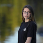 
              Alyssa Burns, 24, is photographed at a park on Friday, Oct. 7, 2022, in Orlando, Fla.  It has always been difficult to be pregnant on the job and to raise a child, but especially so for low-wage workers. They are more likely to work in physically demanding roles with fewer labor protections and less flexibility than higher-wage jobs. When Burns, a warehouse worker earning $16 an hour, learned she was pregnant she came to the agonizing conclusion she couldn't go through with it.  (AP Photo/Phelan M. Ebenhack)
            