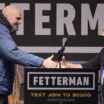 
              Pennsylvania Lt. Gov. John Fetterman, a Democratic candidate for U.S. Senate, left, introduces Dave Matthews who performed during a rally in downtown Pittsburgh, Wednesday, Oct. 26, 2022. (AP Photo/Gene J. Puskar)
            