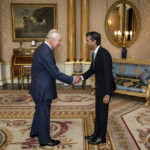 
              King Charles III welcomes Rishi Sunak during an audience at Buckingham Palace, London, where he invited the newly elected leader of the Conservative Party to become Prime Minister and form a new government, Tuesday, Oct. 25, 2022. (Aaron Chown/Pool photo via AP)
            