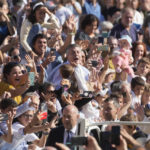 
              Pope Francis meets with members of the Comunione e Liberazione (Communion and Liberation) Catholic lay movement in St. Peter's Square at the Vatican, Saturday, Oct.15, 2022. (AP Photo/Gregorio Borgia)
            