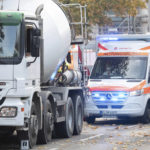 
              A concrete mixer vehicle stands on a road where a cyclist was critically injured in a traffic accident with the truck in Berlin, Germany, Monday, Oct. 31, 2022. German Chancellor Olaf Scholz has urged climate activists to show “creativity” and avoid endangering others following much-criticized protests targeting art works and an incident in which Berlin’s fire service said blockades delayed specialists’ arrival at an accident scene. (Paul Zinken/dpa via AP)
            