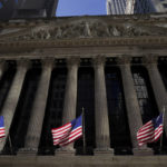 
              FILE - American flags fly outside the New York Stock Exchange, Friday, Sept. 23, 2022, in New York.  (AP Photo/Mary Altaffer, File)
            